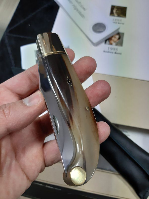 a pocket knife as a gift for him