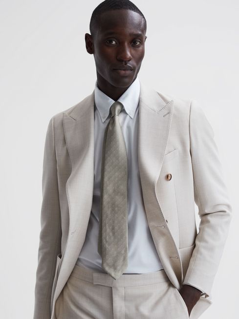 A Stylish Tie Paired with a Luxurious Suit