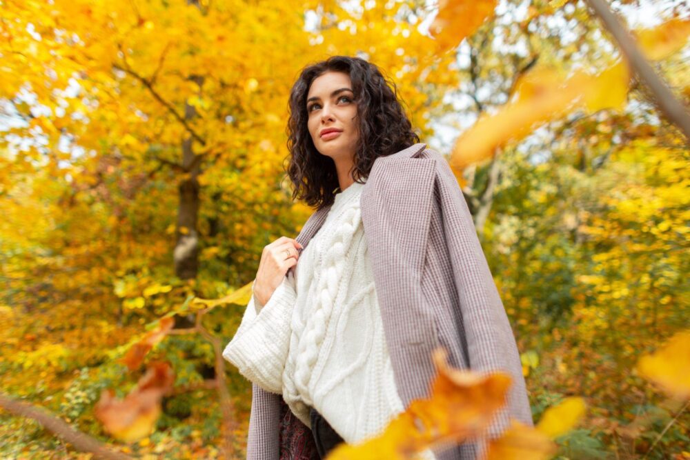 Beautiful Curly Autumn Girl Model In A Fashionable Coat With A K
