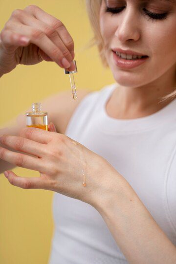 Woman Applying Serum 23 2149396162